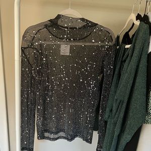 Black sheer long sleeve top with stars